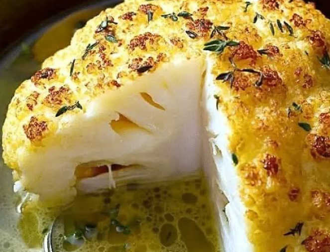 A Very Tasty Slow Cooker Whole Roasted Cauliflower With Butter Sauce